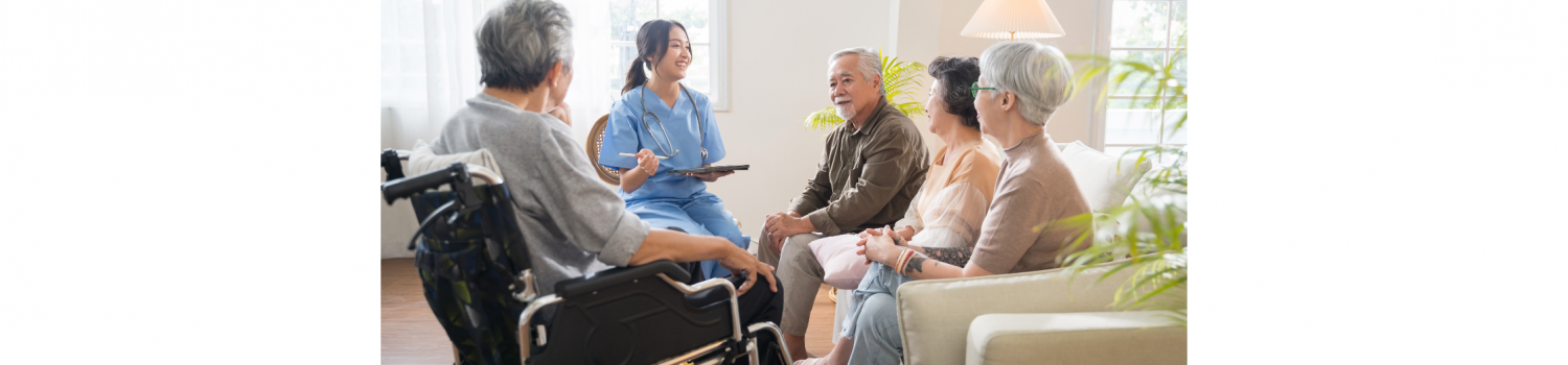 Patients talking with a healthcare worker holding a clipboard