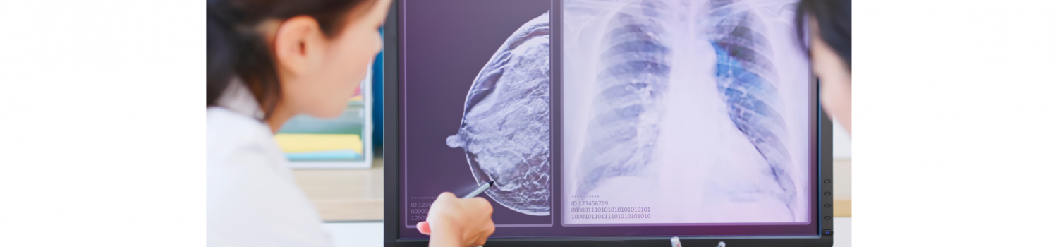 woman doctor showing mammography test results and X-ray on a computer to a patient